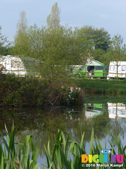 FZ029009 Campervan reflected in pond